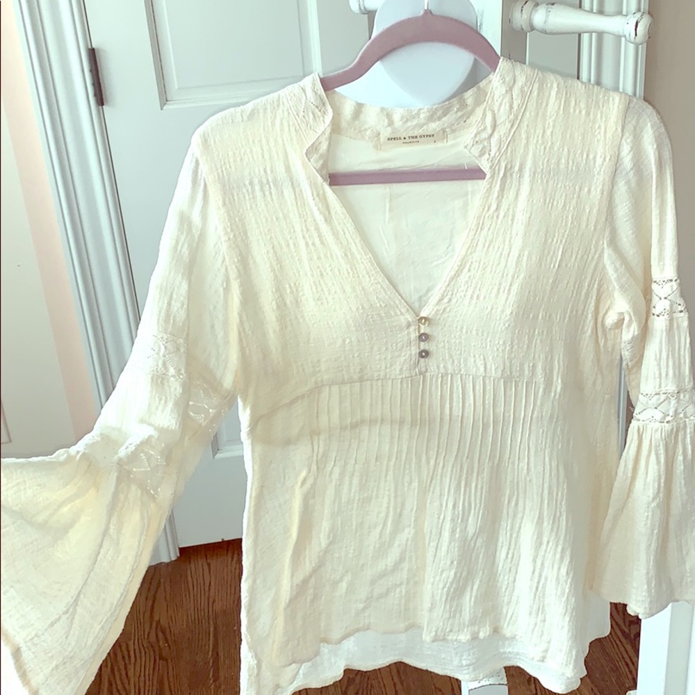 Spell top.  Size Small.  Cream.  V-neck.